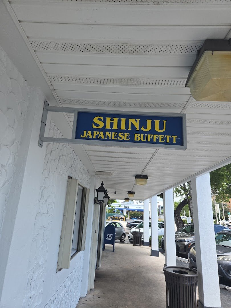 Hibachi counter beside rows of buffet dishes
